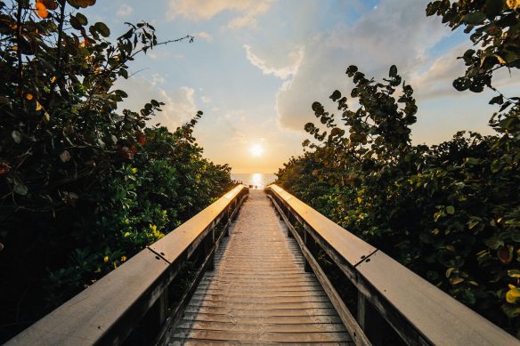 backlit-boardwalk-clouds-316801